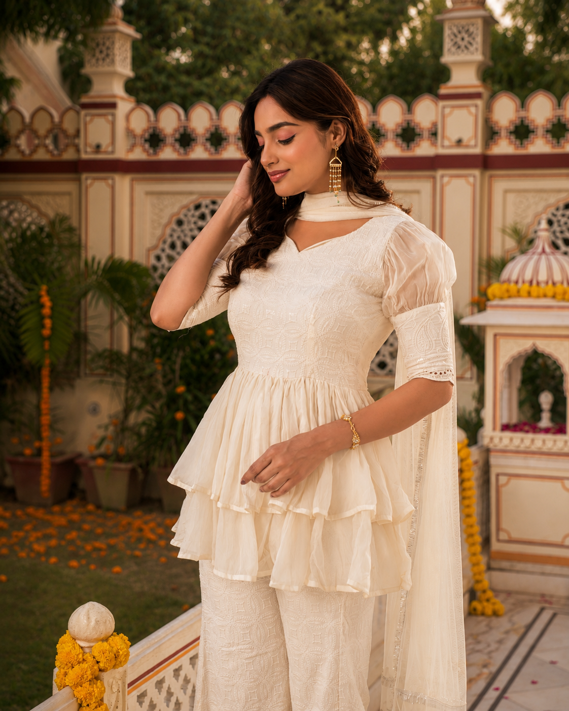 Indianvirasat Moonlight Sharara Set featuring a light-colored kurta with intricate embroidery and matching wide-leg sharara pants.