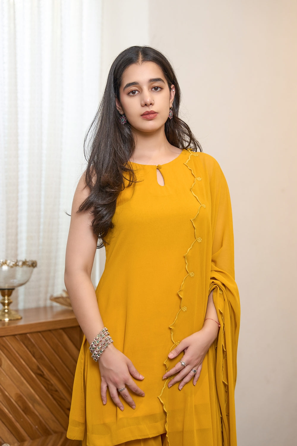 Indianvirasat Aarinya Mustard Grace Kurta Set featuring a traditional mustard yellow kurta with intricate embroidery and matching dupatta.