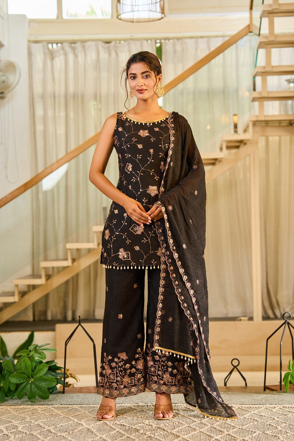 Indianvirasat Zivara Noir Heritage Kurta Set with intricate embroidery and traditional design, displayed on a hanger.