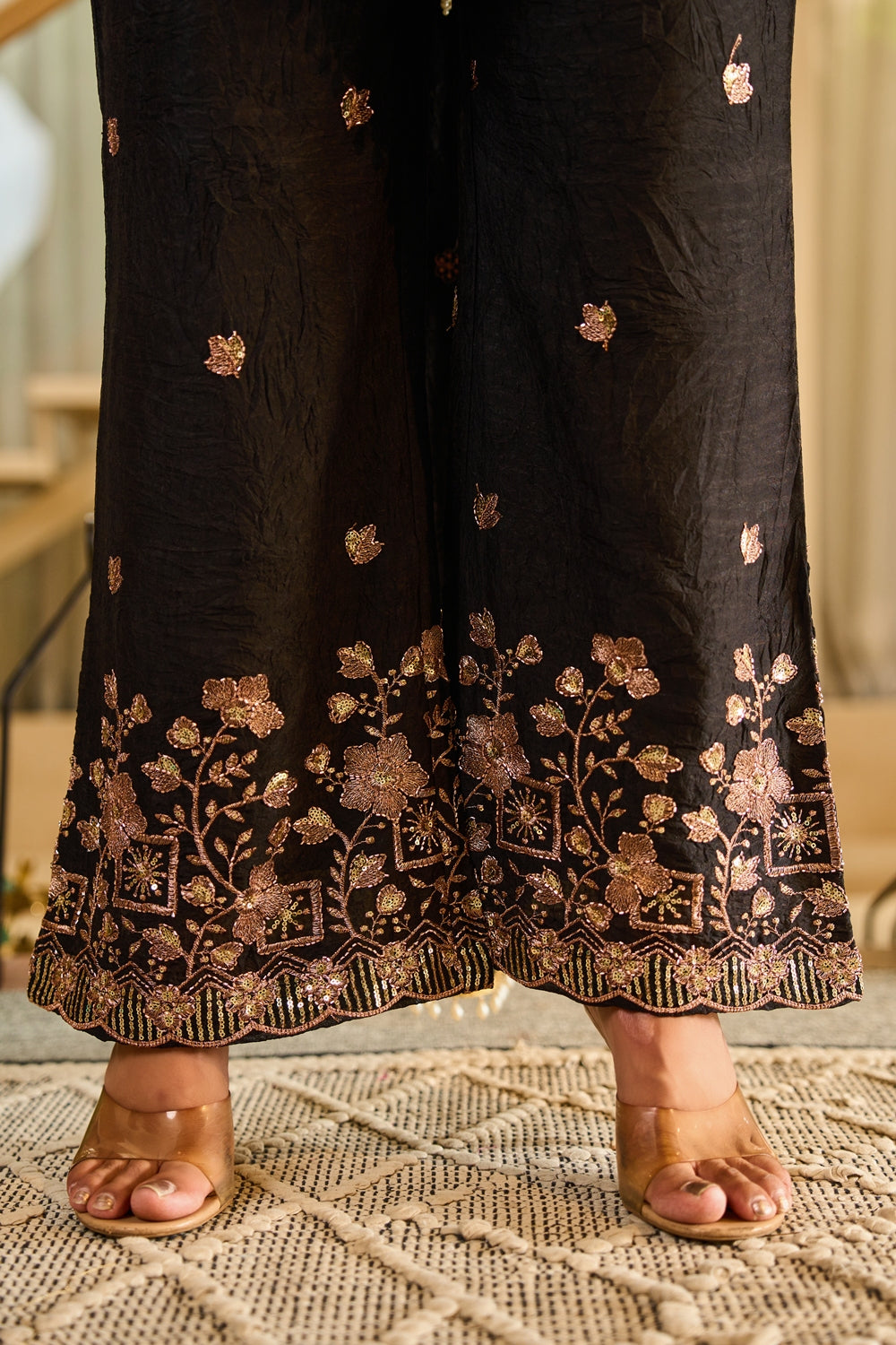 Indianvirasat Zivara Noir Heritage Kurta Set with intricate embroidery and traditional design, displayed on a hanger.