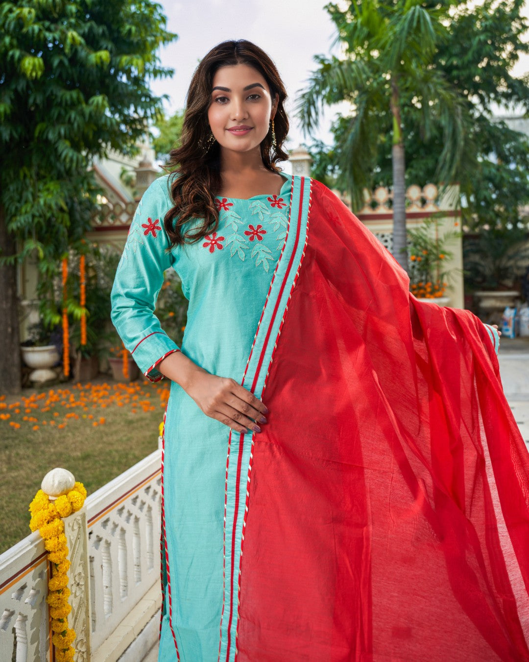 Indianvirasat Aqua Meher Kurta Set featuring a vibrant blue kurta with intricate embroidery and matching palazzo pants.