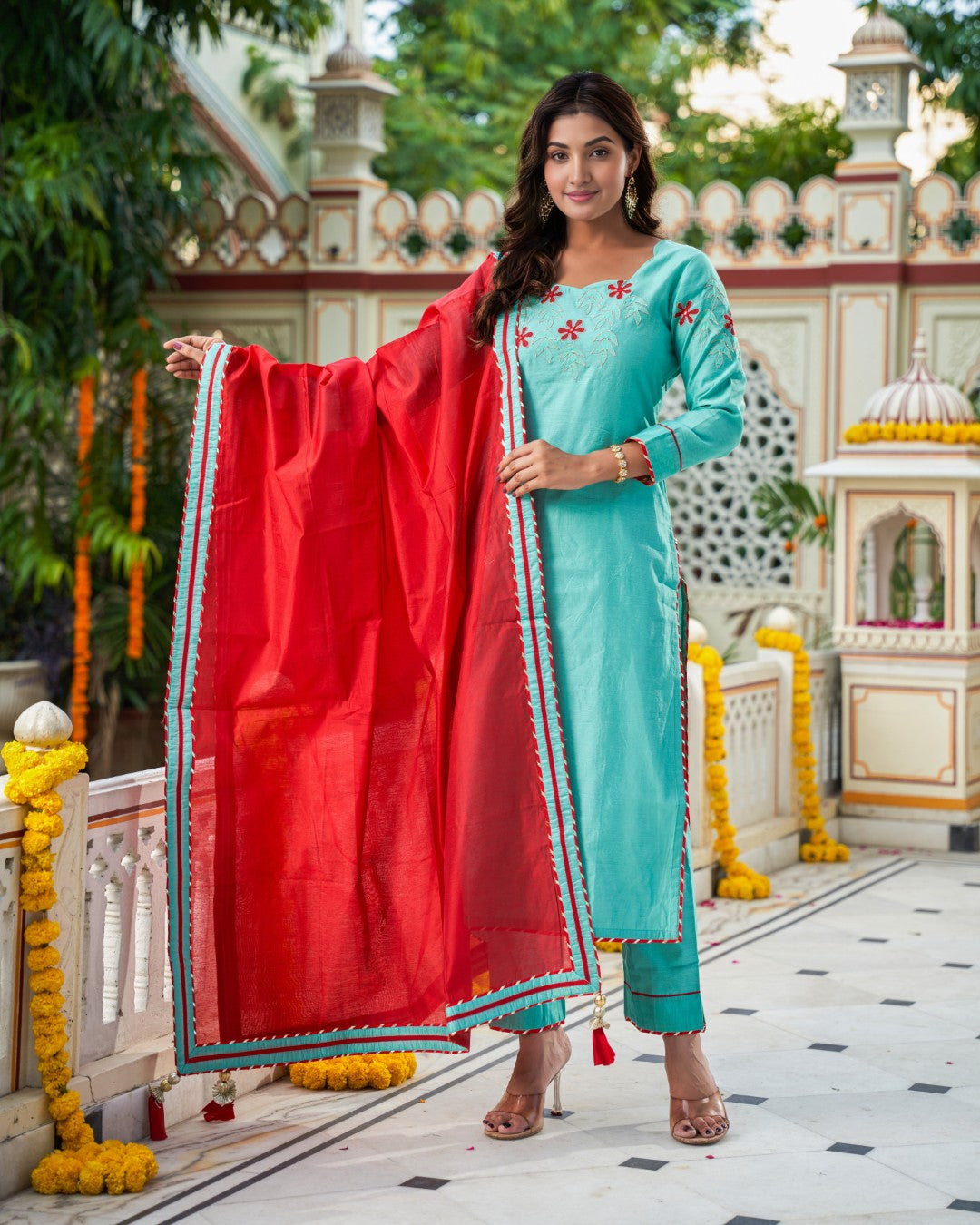 Indianvirasat Aqua Meher Kurta Set featuring a traditional kurta with intricate embroidery and matching bottoms, displayed on a mannequin.