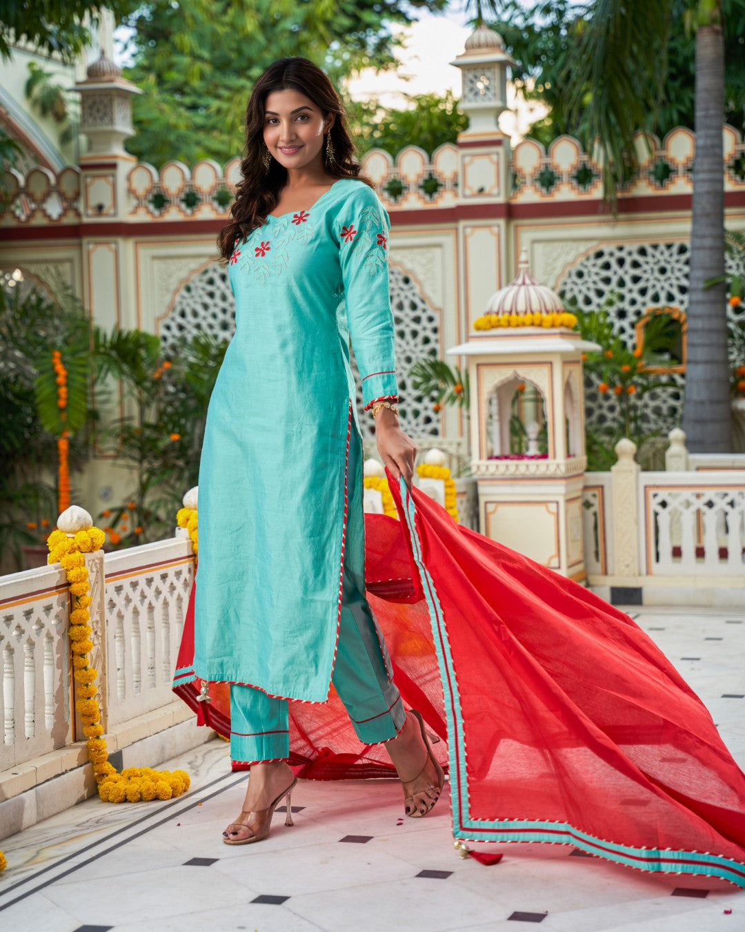 Indianvirasat Aqua Meher Kurta Set featuring a vibrant, traditional design with intricate embroidery and matching bottoms.