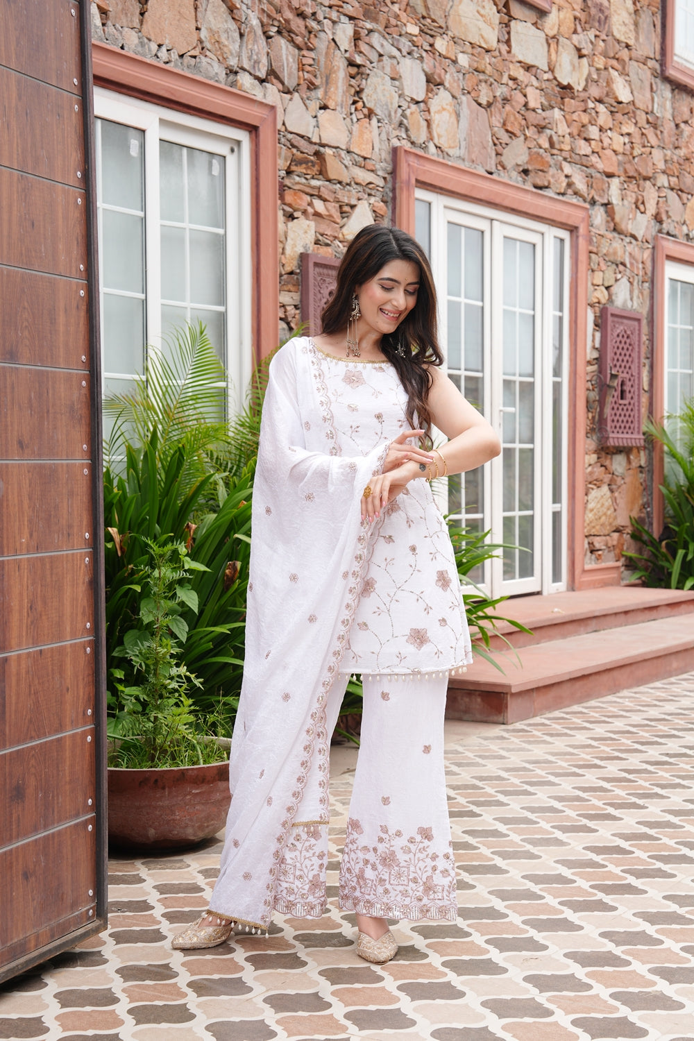 Eshaal white wedding wear kurta set by Indianvirasat featuring intricate embroidery and elegant traditional design.