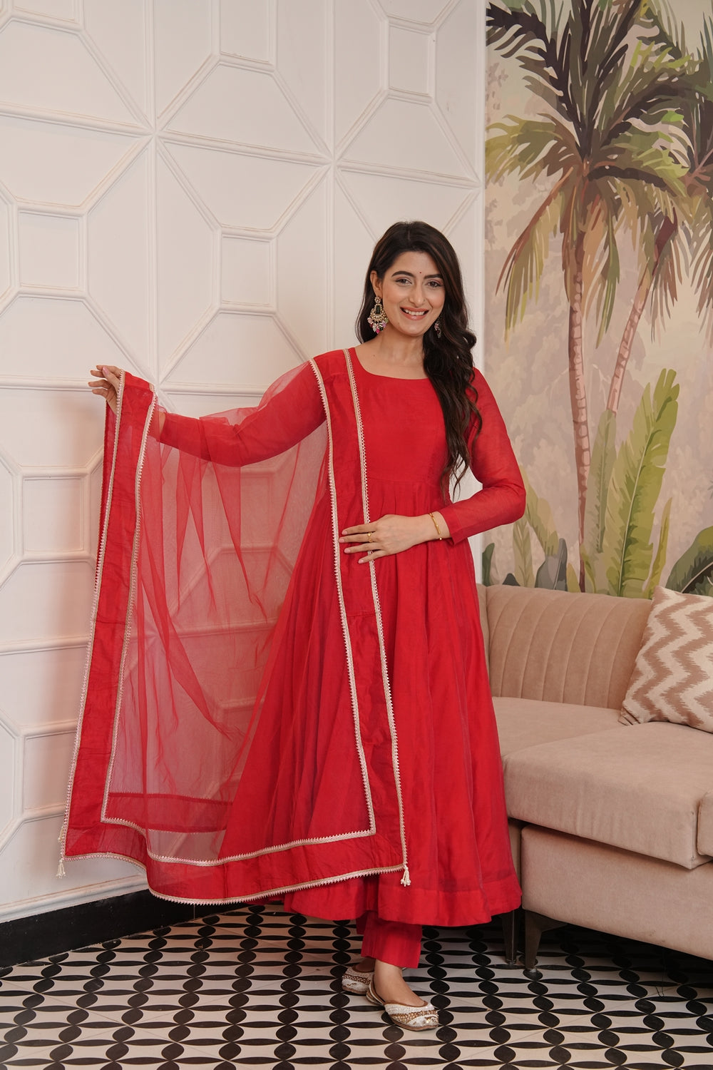 Indian Virasat Soundarya Red Anarkali Suit set featuring traditional embroidery and flowing silhouette, displayed on a hanger.