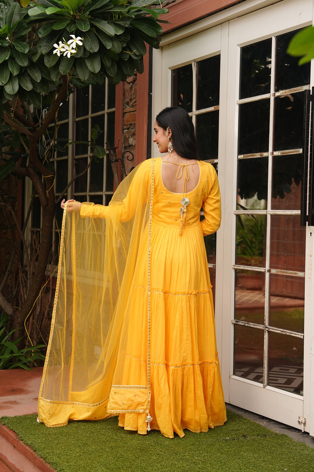 Indian Virasat Saba yellow cotton ethnic dress with traditional embroidery, showcasing vibrant fabric and intricate design.