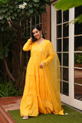 Indian Virasat Saba Yellow Cotton Ethnic Dress with traditional embroidery and vibrant design, perfect for cultural occasions.