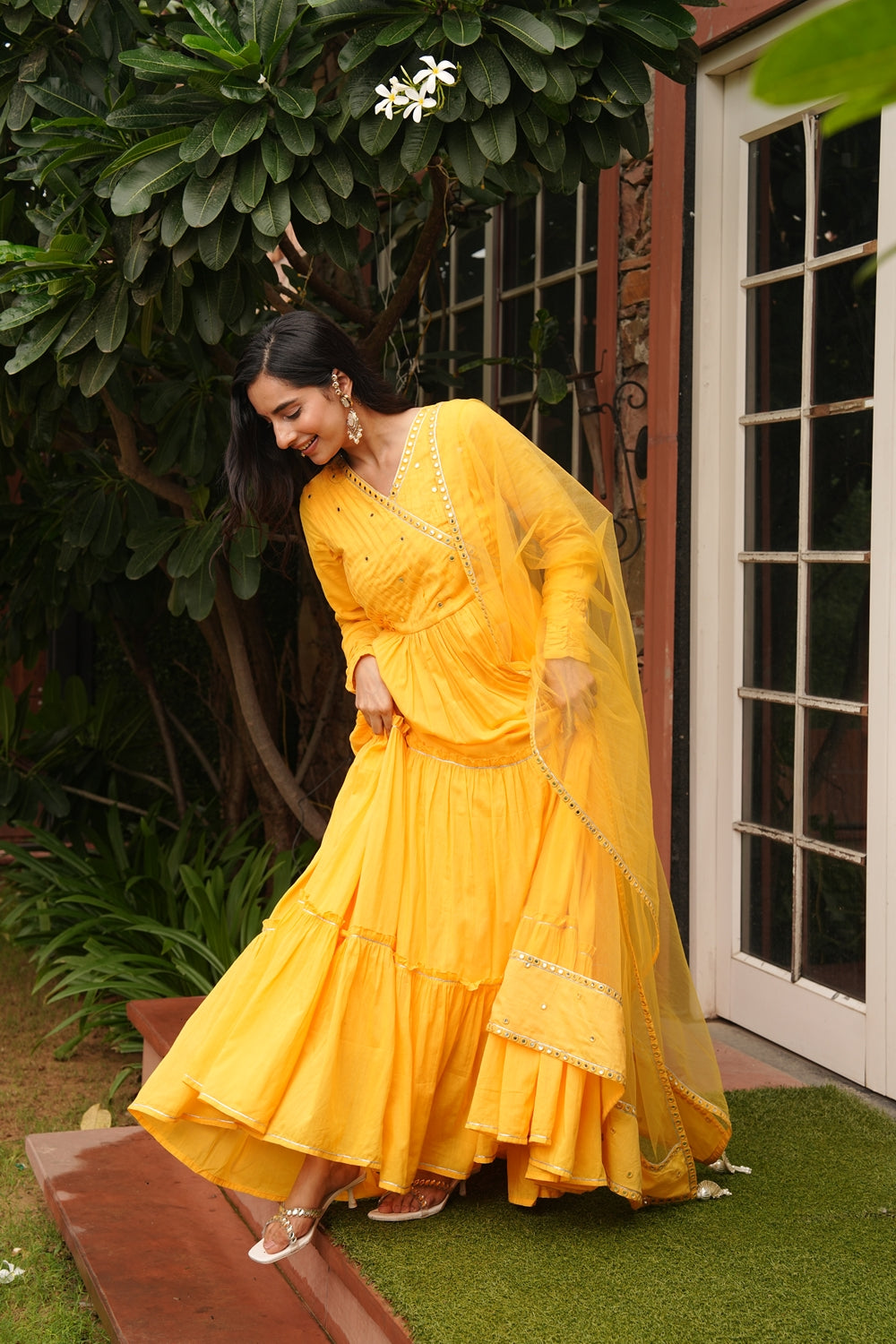 Indian Virasat Saba yellow cotton ethnic dress with traditional embroidery and flowy silhouette, perfect for cultural occasions.