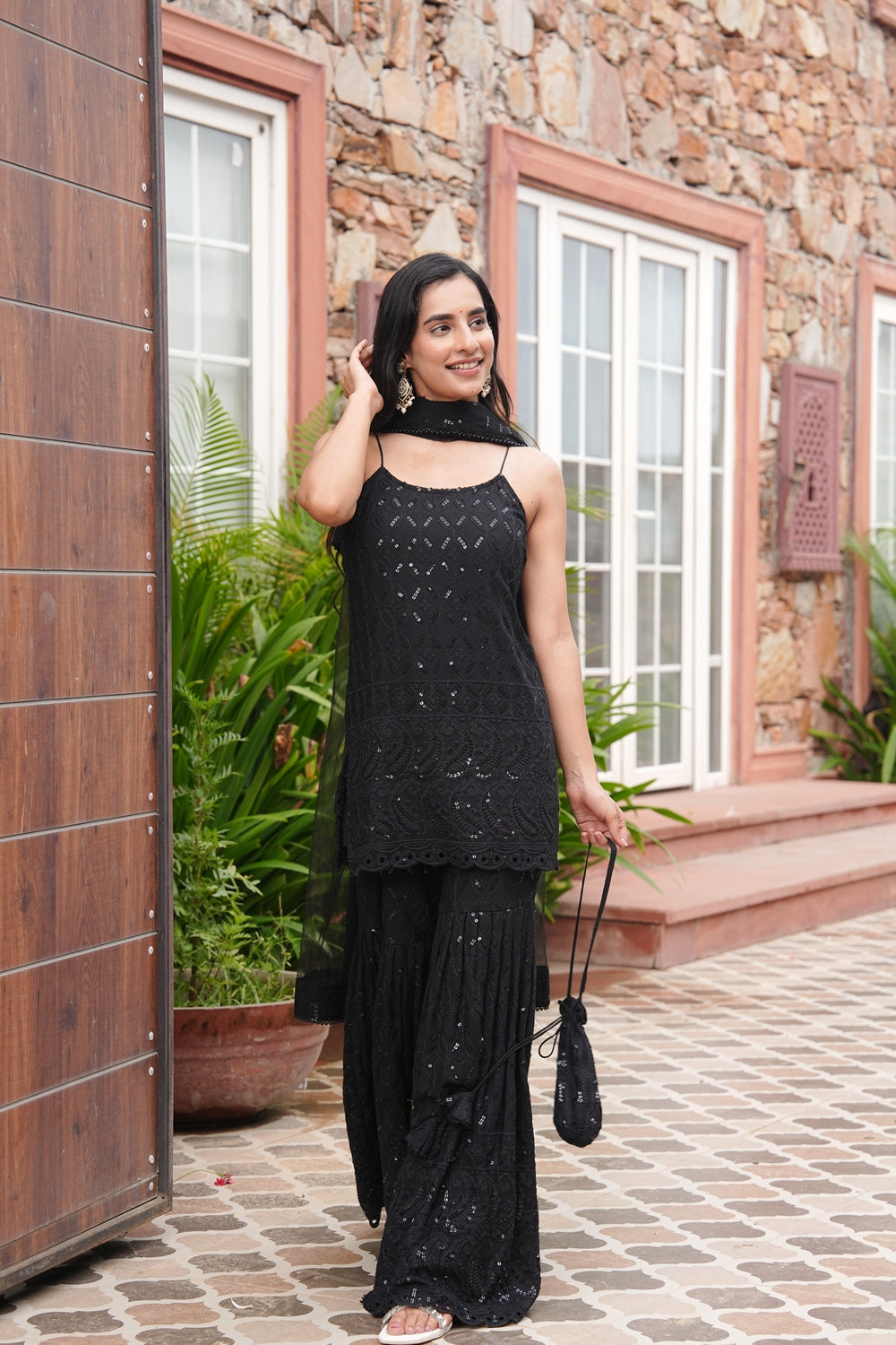 Indianvirasat Srivalli black tie-up Sharara set with intricate embroidery and matching dupatta, traditional Indian attire.