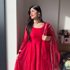 Elegant red Anarkali suit set from Indian Virasat featuring intricate embroidery and traditional design, perfect for festive occasions.