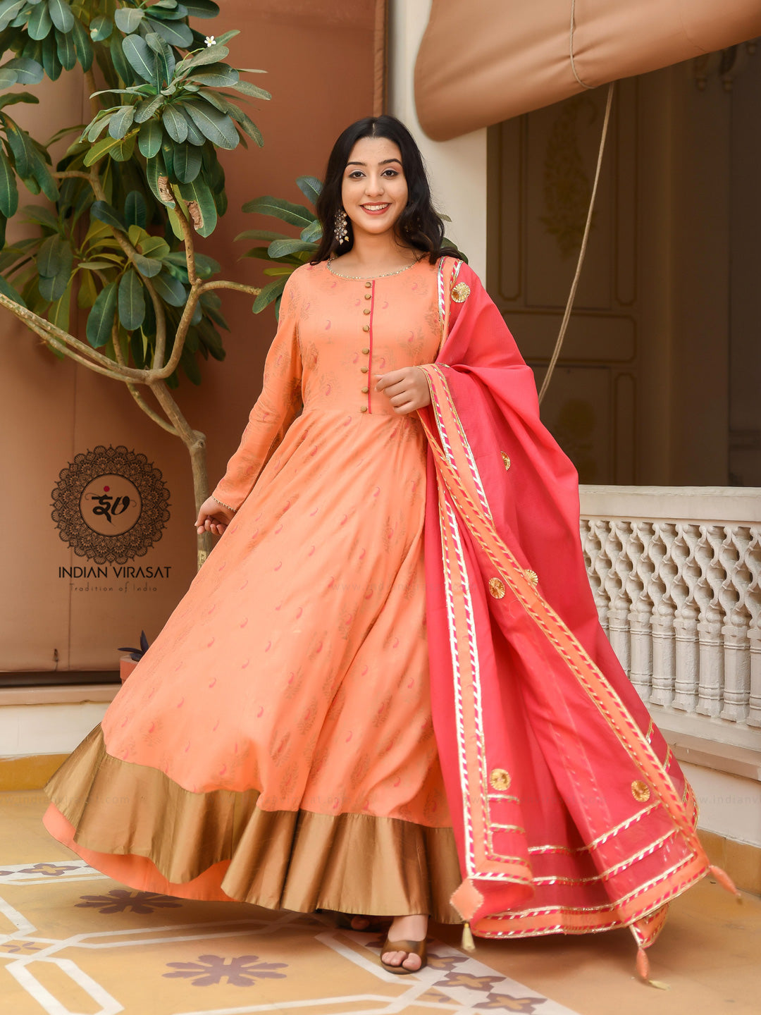 Aisha Imran - This beautiful peach dress is a kalidaar pishwas with a  worked neckline, paired with an off-white sharara and a plain organza  dupatta with spray of sequins. For more details,
